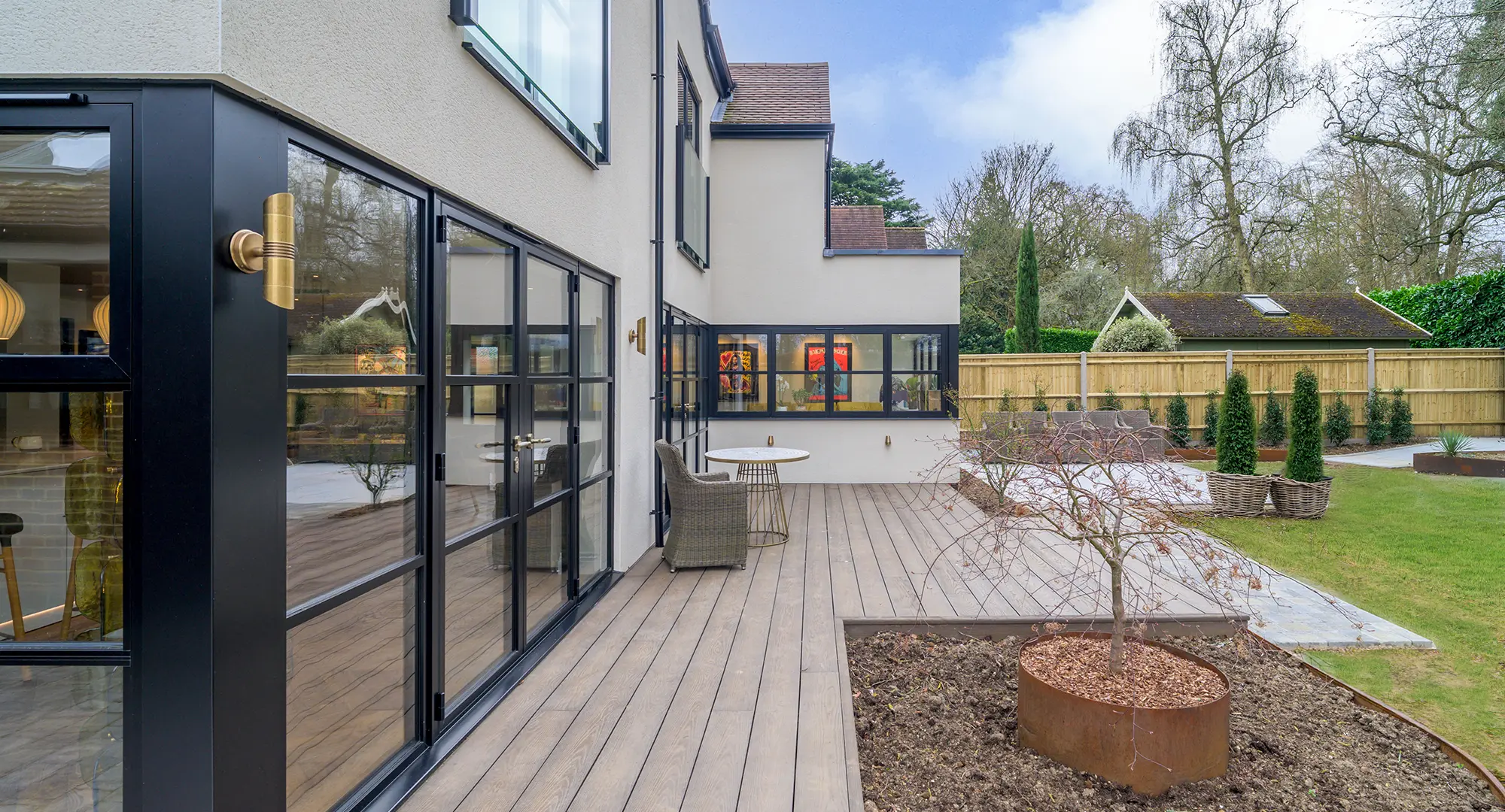 Decking area with contemporary planting - rear of 4 Thorne Close, Henley