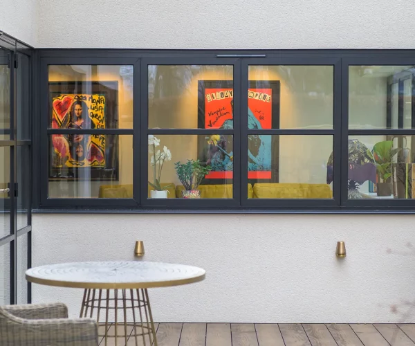 Outdoor space looking through to relaxation space with contemporary art, Thorne Close, Henley